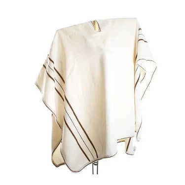 Cream colored woven poncho with brown stripe details