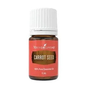 Young Living Carrot Seed 100% Pure Essential Oil in a small amber glass bottle