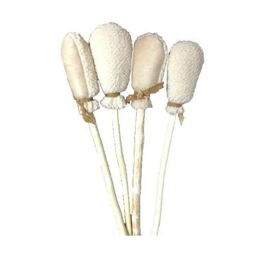 Set of four white shamanic drum beaters with soft padded heads and wooden handles.