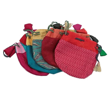 Assorted colorful fabric pouches for crystals and ritual tools