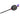 Handcrafted shamanic rattle with bird engraving and purple feathers on a wooden handle