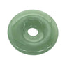 Polished green jade circular pendant with a central hole for ritual jewellery.