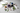Assorted crystals including amethyst cluster, rose quartz stones, lapis lazuli sphere and selenite wand.