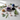 Assorted crystals including amethyst cluster, rose quartz stones, lapis lazuli sphere and selenite wand.