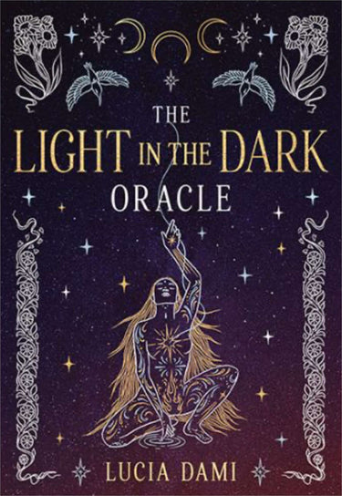 Book cover for 'The Light in the Dark Oracle' by Lucia Dami, featuring a dark purple celestial background with stars, moons, birds, and a kneeling figure with long flowing hair.