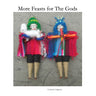 Two handcrafted textile dolls in colorful ritual clothing for altar decor.
